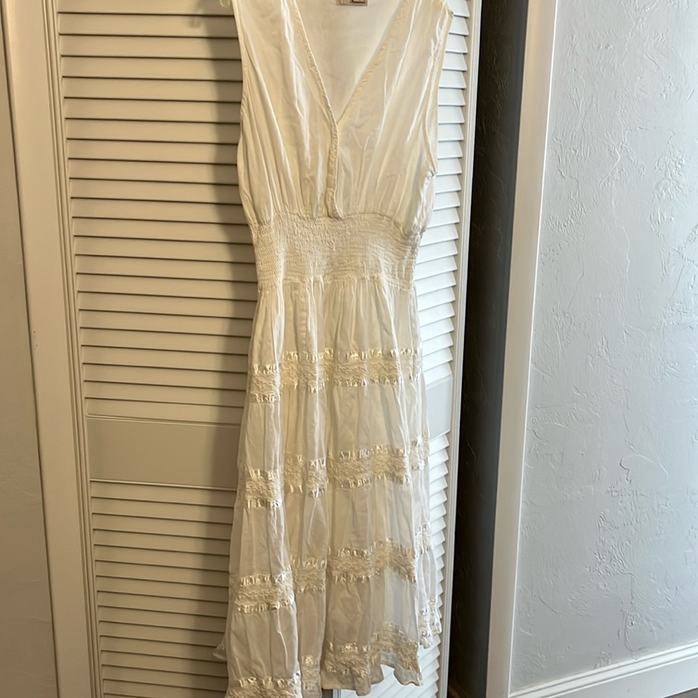 Advance Apparels cross over bodice with tiered ribbon skirt portion